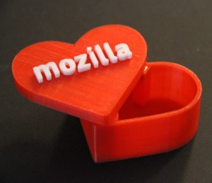 A heart shaped box with Mozilla embossed on top.